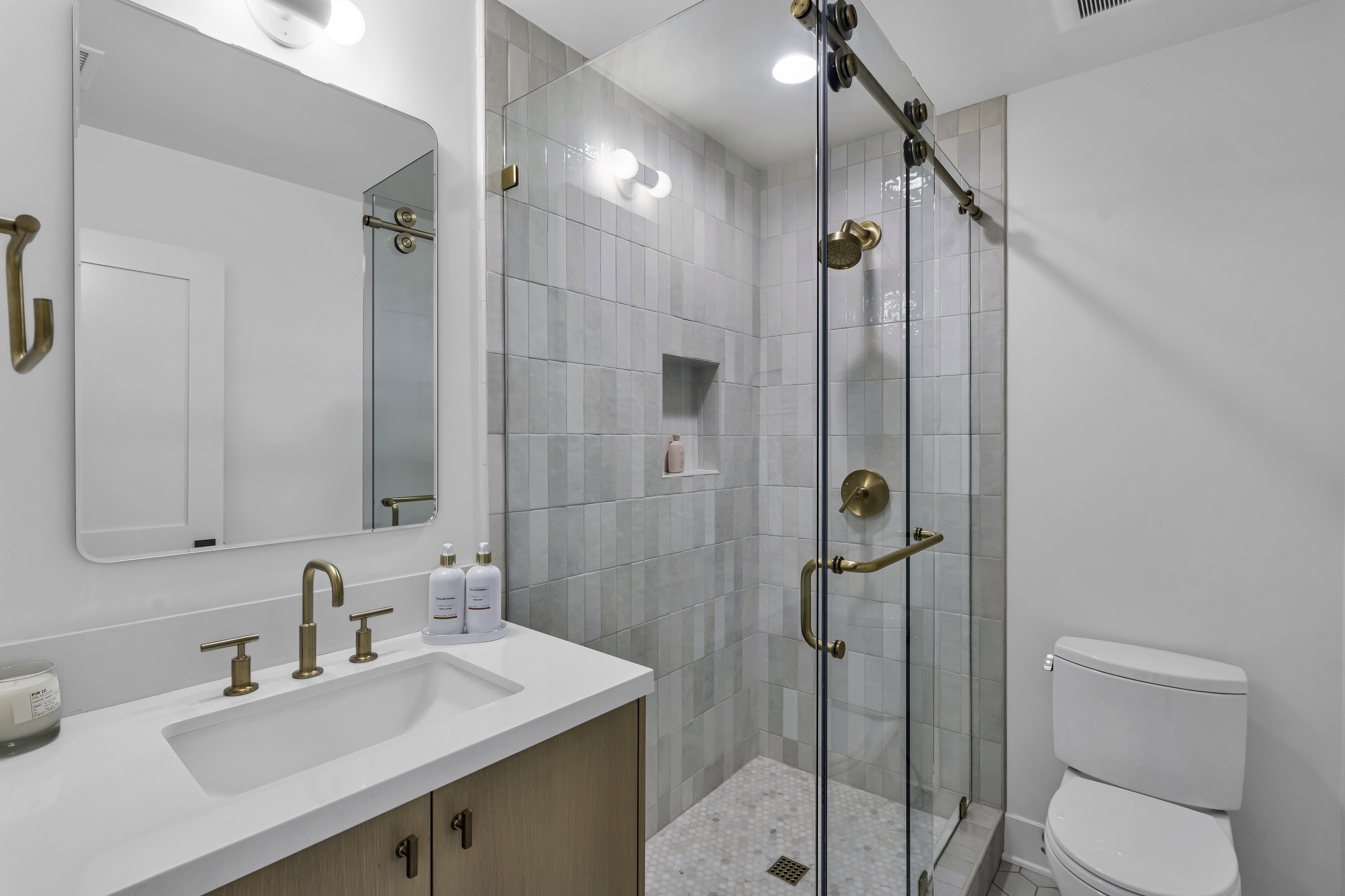 Equestrian Drive home renovation photo 15 — staircase and entryway after complete renovation