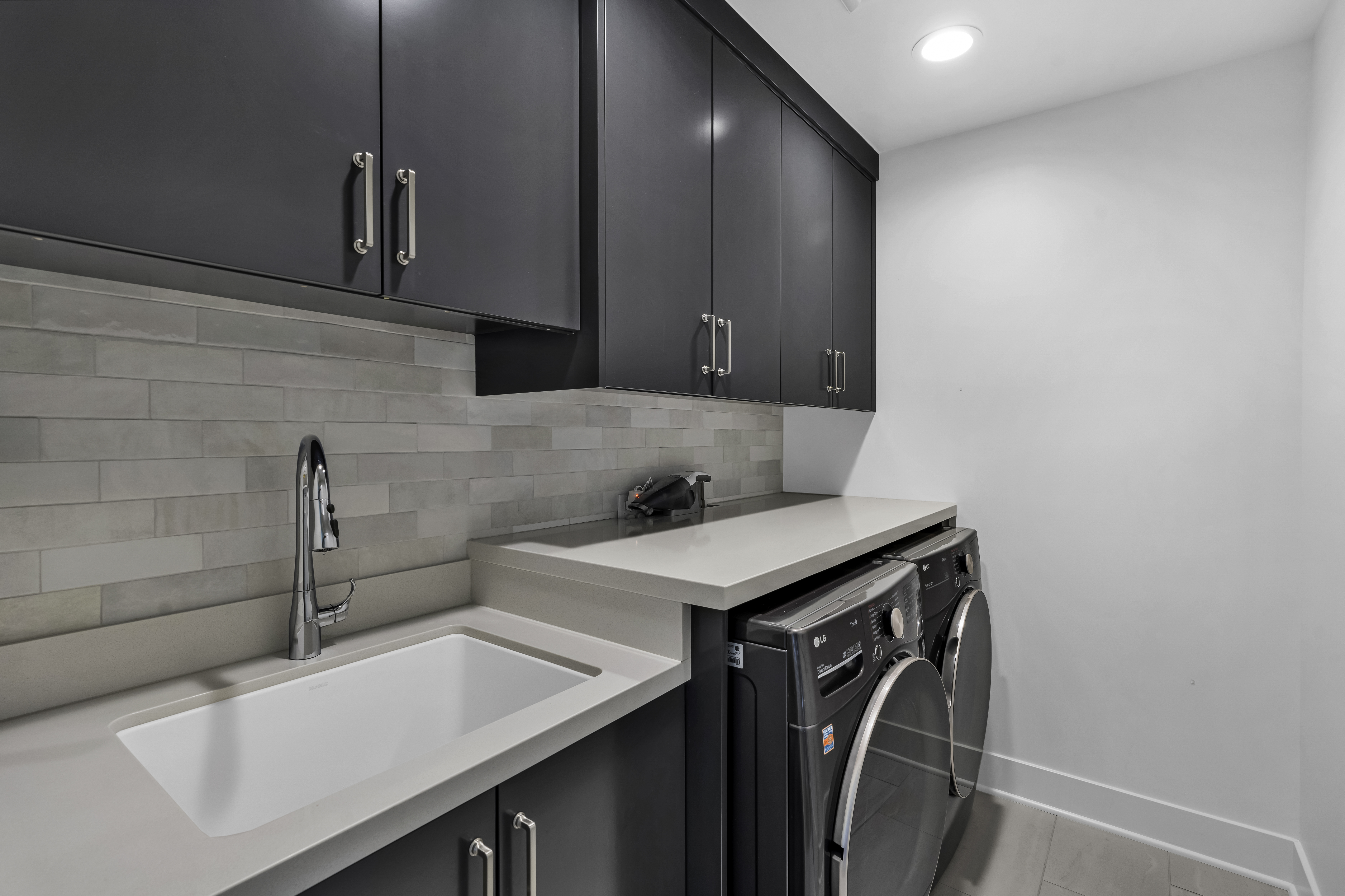 Equestrian Drive home renovation photo 16 — rear exterior view showing new outdoor living area in Santa Ana