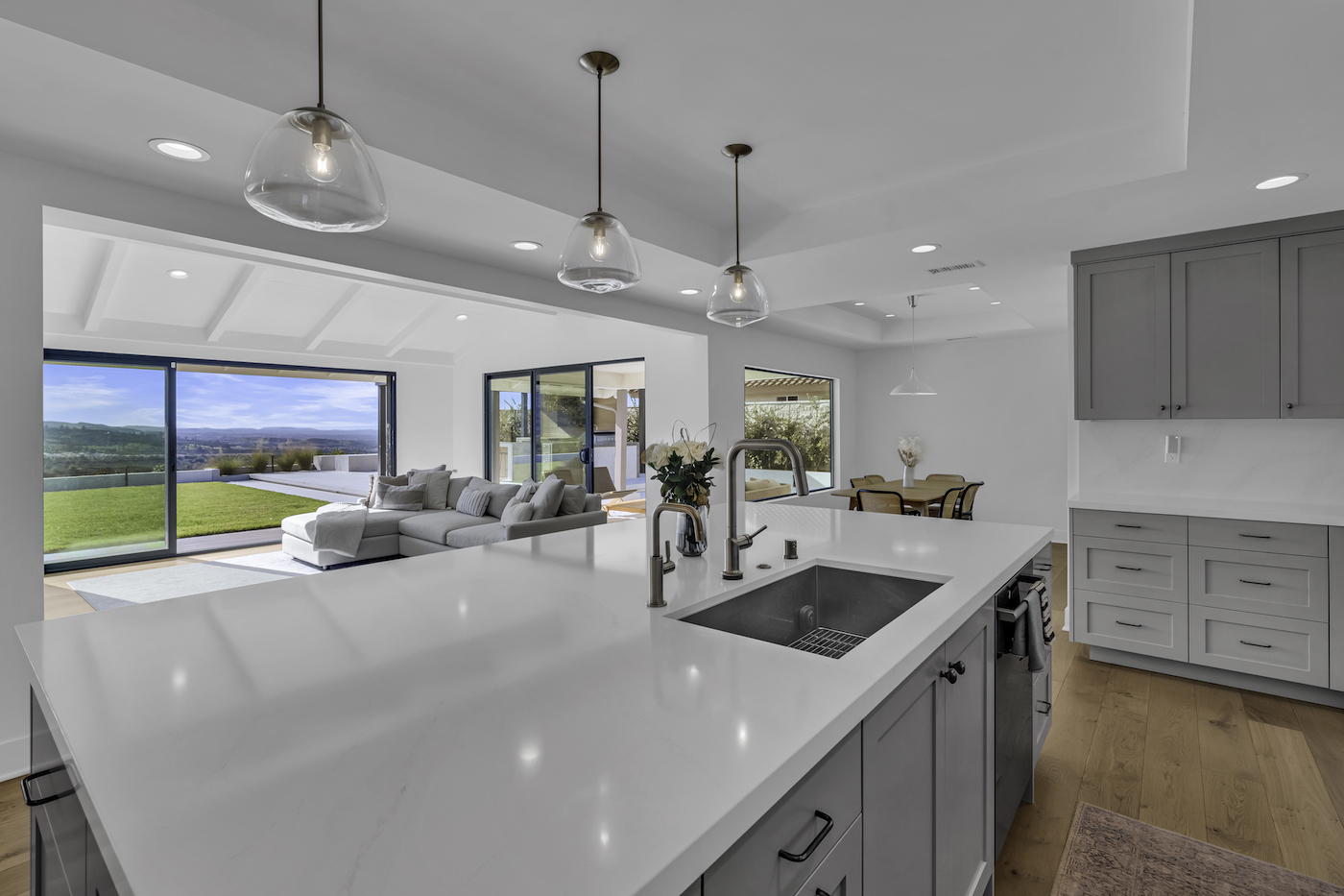 Equestrian Drive home renovation photo 5 — hallway with new hardwood flooring in Santa Ana home